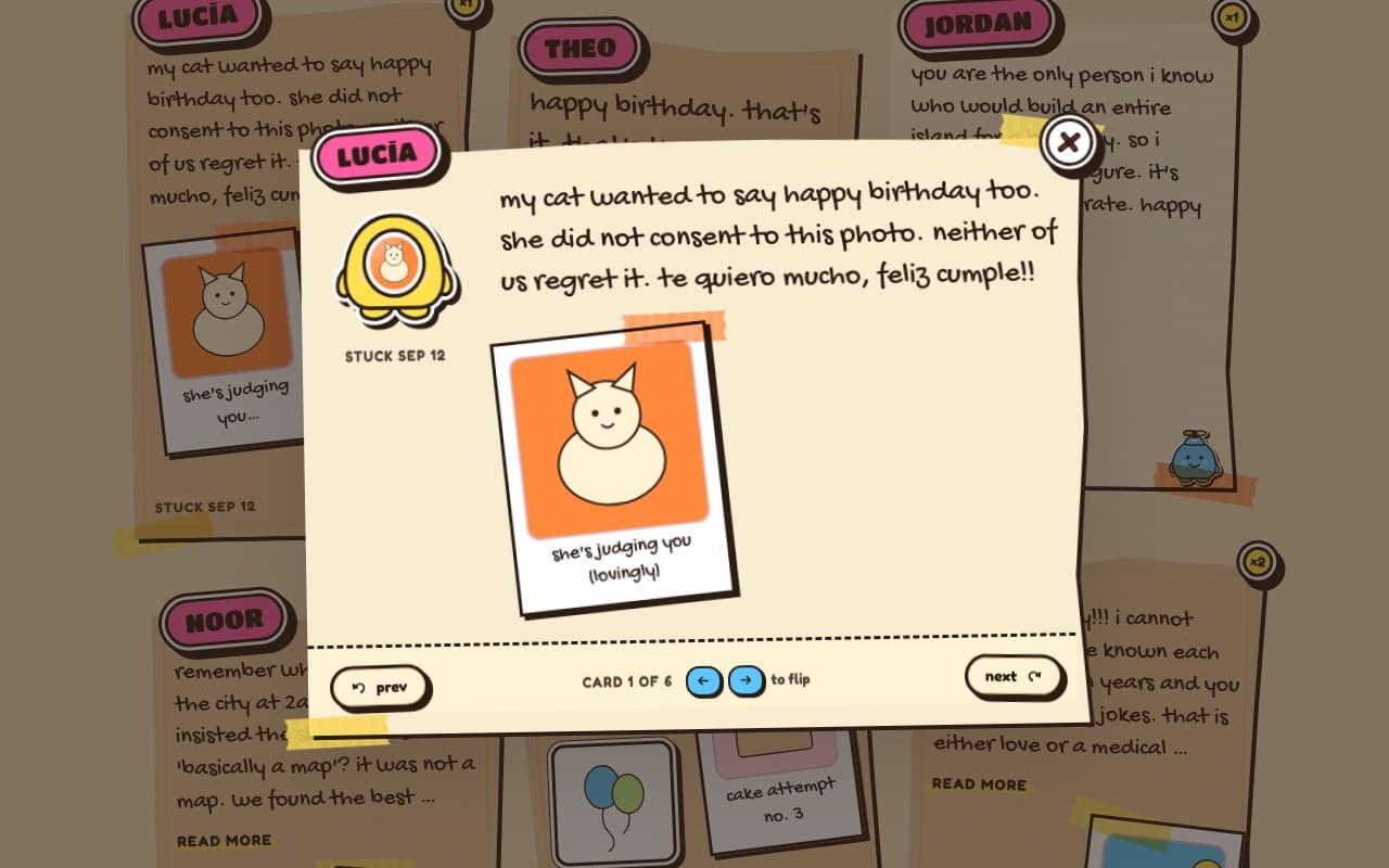 a card opened on the board: Lucía's note and a photo of her cat, with prev and next buttons
